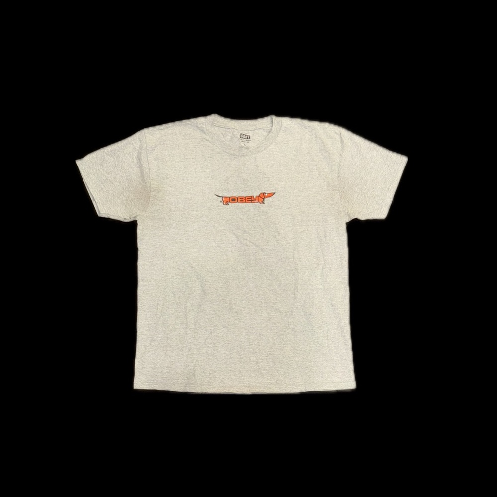 Grey OBEY shirt with orange dog accent